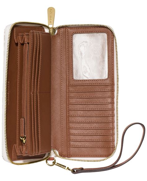 michael kors jet set travel wallet white|Michael Kors travel continental wallet.